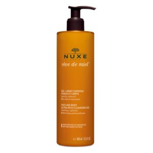 Flasche mit orangefarbenem Gel für Gesicht und Körper von NUXE, mit Pumpverschluss und Hinweis auf Honig und Sonnenblume.