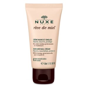 Hand- und Nagelcreme von Nuxex in einer 50ml-Tube, beige mit brauner Verschlusskappe, betont pflegende Inhaltsstoffe.