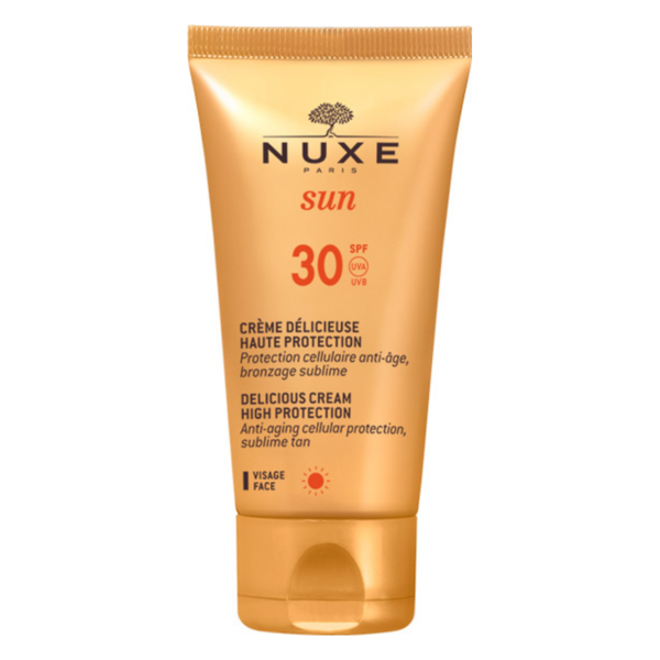 Sonnenschutzcreme von NUXE in einer goldfarbenen Tube mit SPF 30, für das Gesicht, mit Anti-Aging-Eigenschaften.