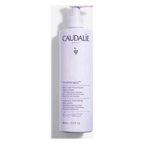 Flasche mit hyaluronhaltiger Körperlotion von Caudalie, lila Verpackung mit Pumpe, 400ml.