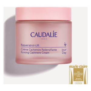 Runde Rosatönige Cremeverpackung von Caudalie mit Aufschrift zu einer straffenden Tagescreme.
