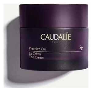 Glitzernde violette Cremedose von Caudalie mit dem Schriftzug Premier Cru La Crème The Cream.