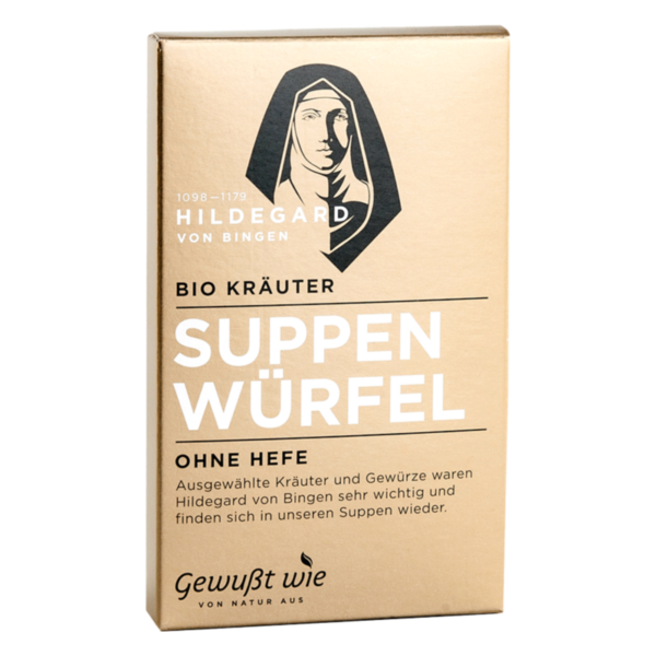 Verpackung von Bio Kräuter Suppenwürfel, goldfarben mit Illustration von Hildegard von Bingen und Textinformationen.