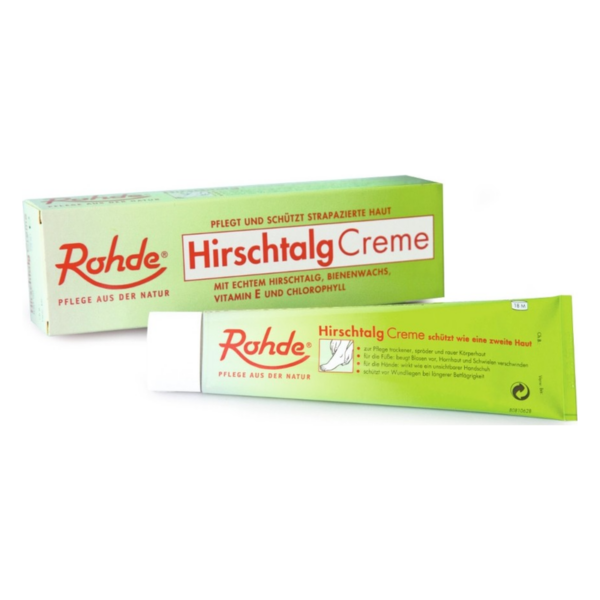 Rohde Hirschtalcreme in einer grünen Tube neben der Verpackung, die zur Hautpflege dient.