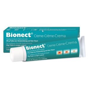 Bionect Creme in einem 30 g Tube, verpackt in einer turquoise-blauen Schachtel mit mehrsprachiger Beschreibung.