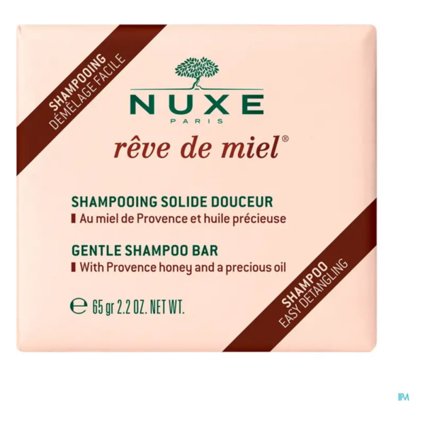 Festes Shampoo von NUXE mit Provence-Honig und kostbarem Öl, verpackt in einer rosa Box.