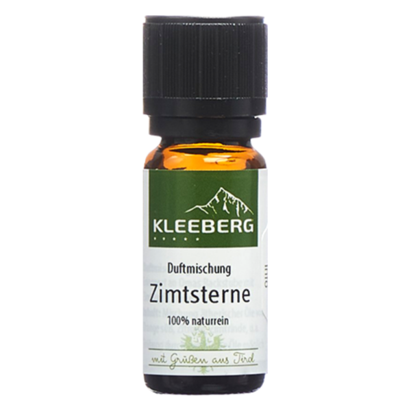 Braune Glasflasche mit schwarzem Deckel und grün-weißer Etikettierung für eine 100% reine Duftmischung namens Zimtsterne.