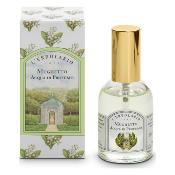 Flasche mit Eau de Parfum Mughetto in einer transparenten Verpackung mit goldfarbenem Verschluss und floralem Design.
