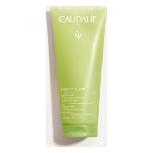 Grüner Duschgelbehälter von Caudalie mit der Bezeichnung "Fleur de Vigne", vegan und hautverträglich, 200 ml.
