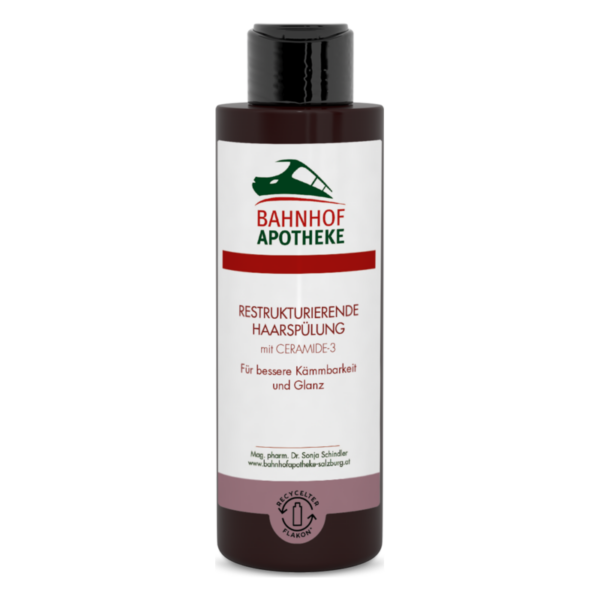 Flasche mit restrukturierender Haarspülung von Bahnhof Apotheke, enthält Ceramide-3 für bessere Kämmbarkeit und Glanz.