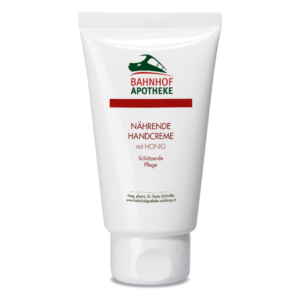 Tube mit nährender Handcreme mit Honig, Schutzpflege von Bahnhof Apotheke, weiß mit farbigen Akzenten.