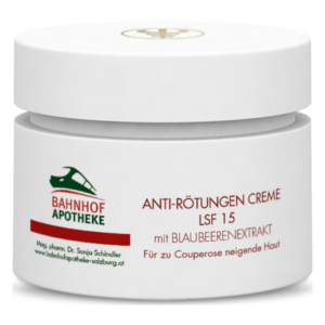 Weiße Cremeverpackung für Anti-Rötungen mit LSF 15 und Blaubeerenextrakt, für zu Couperose neigende Haut.
